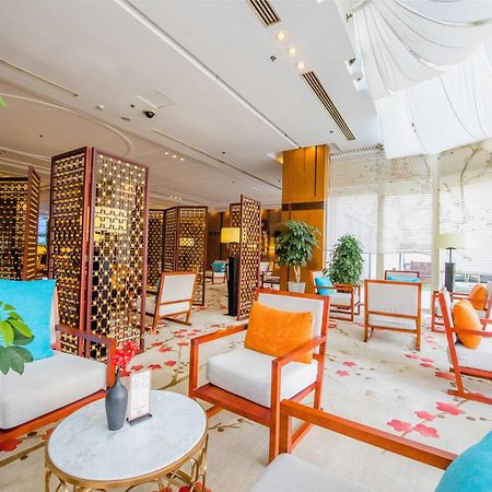 Ruishi Hotel Dalian Bagian luar foto