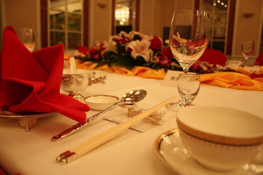 Ruishi Hotel Dalian Bagian luar foto
