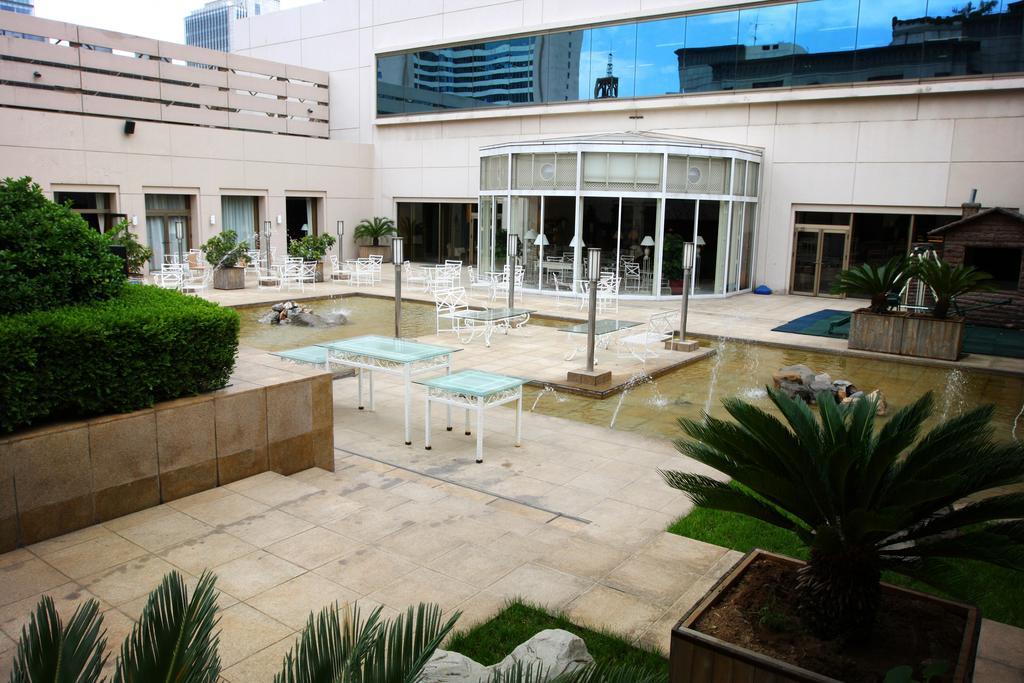 Ruishi Hotel Dalian Bagian luar foto