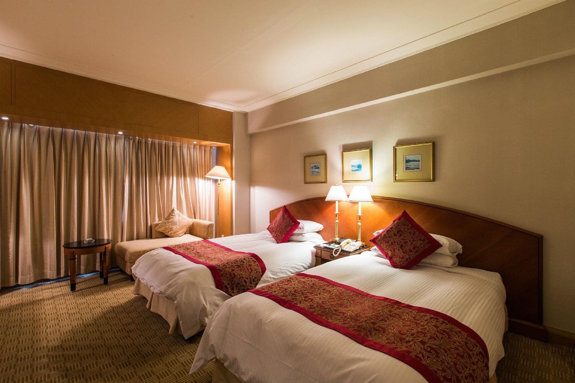 Ruishi Hotel Dalian Bagian luar foto