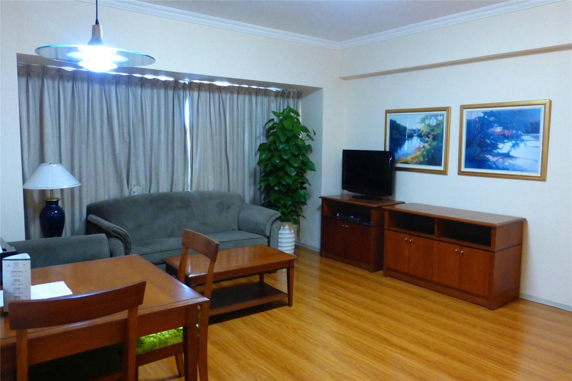 Ruishi Hotel Dalian Bagian luar foto