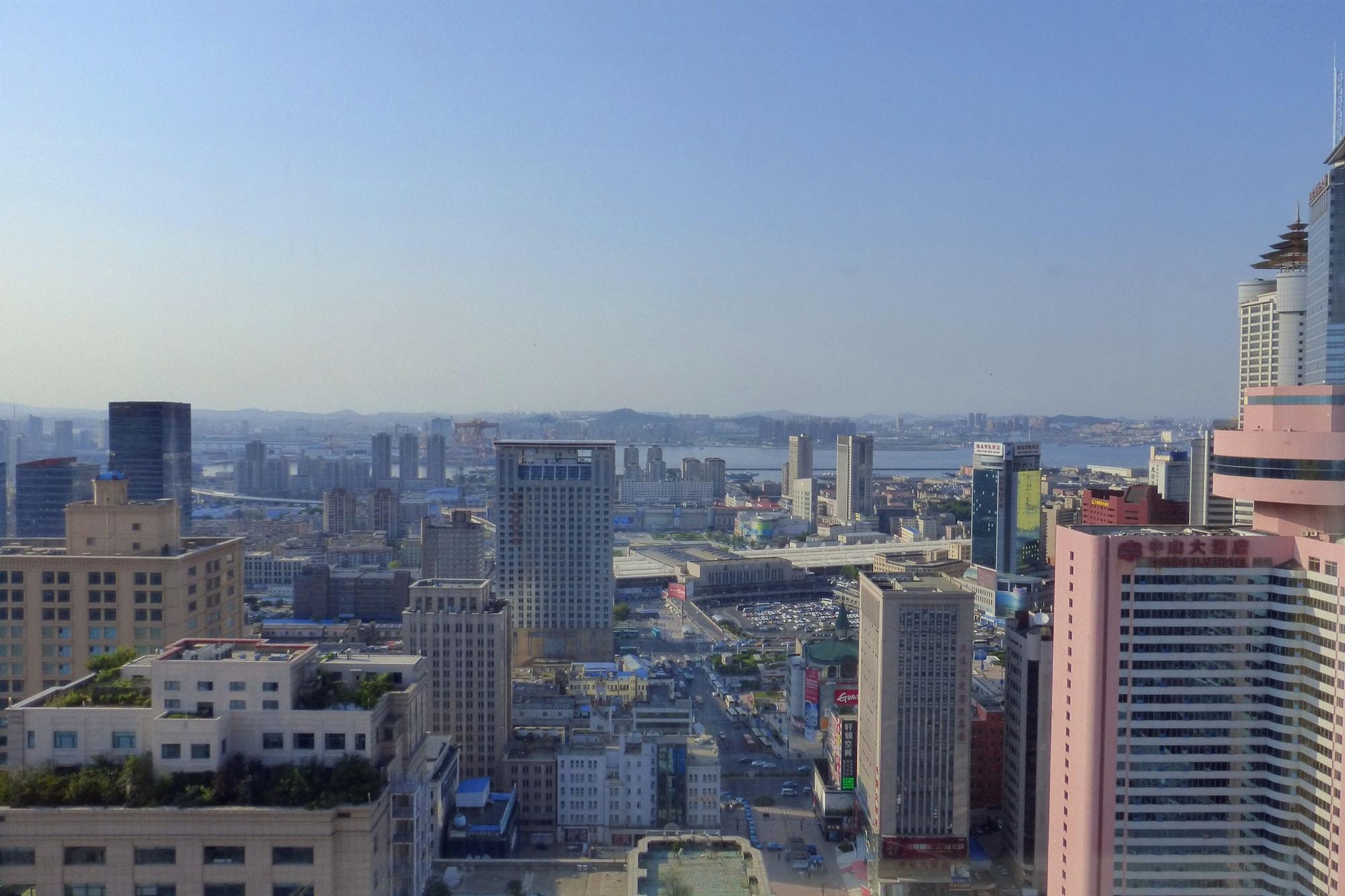 Ruishi Hotel Dalian Bagian luar foto