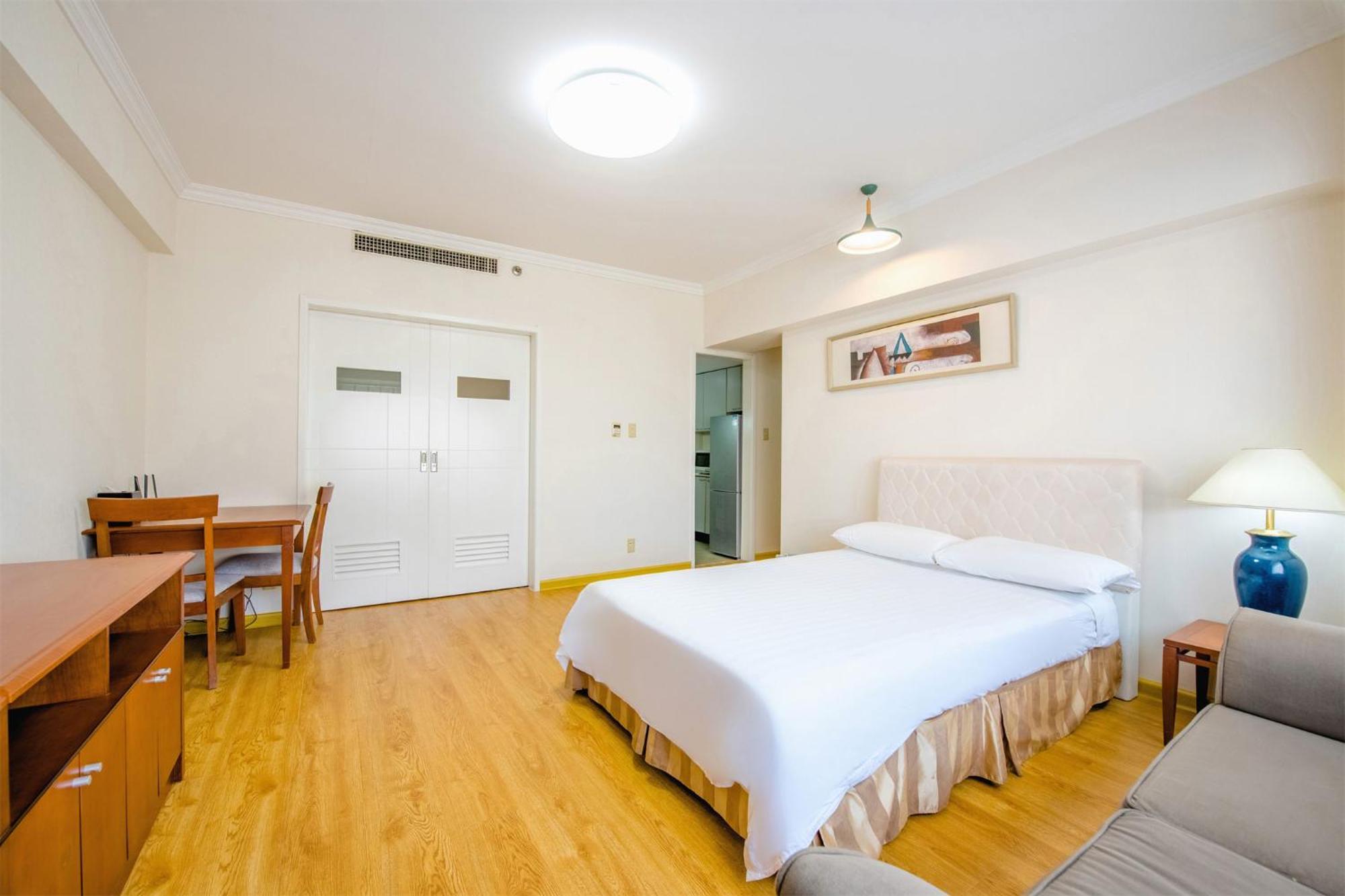 Ruishi Hotel Dalian Bagian luar foto