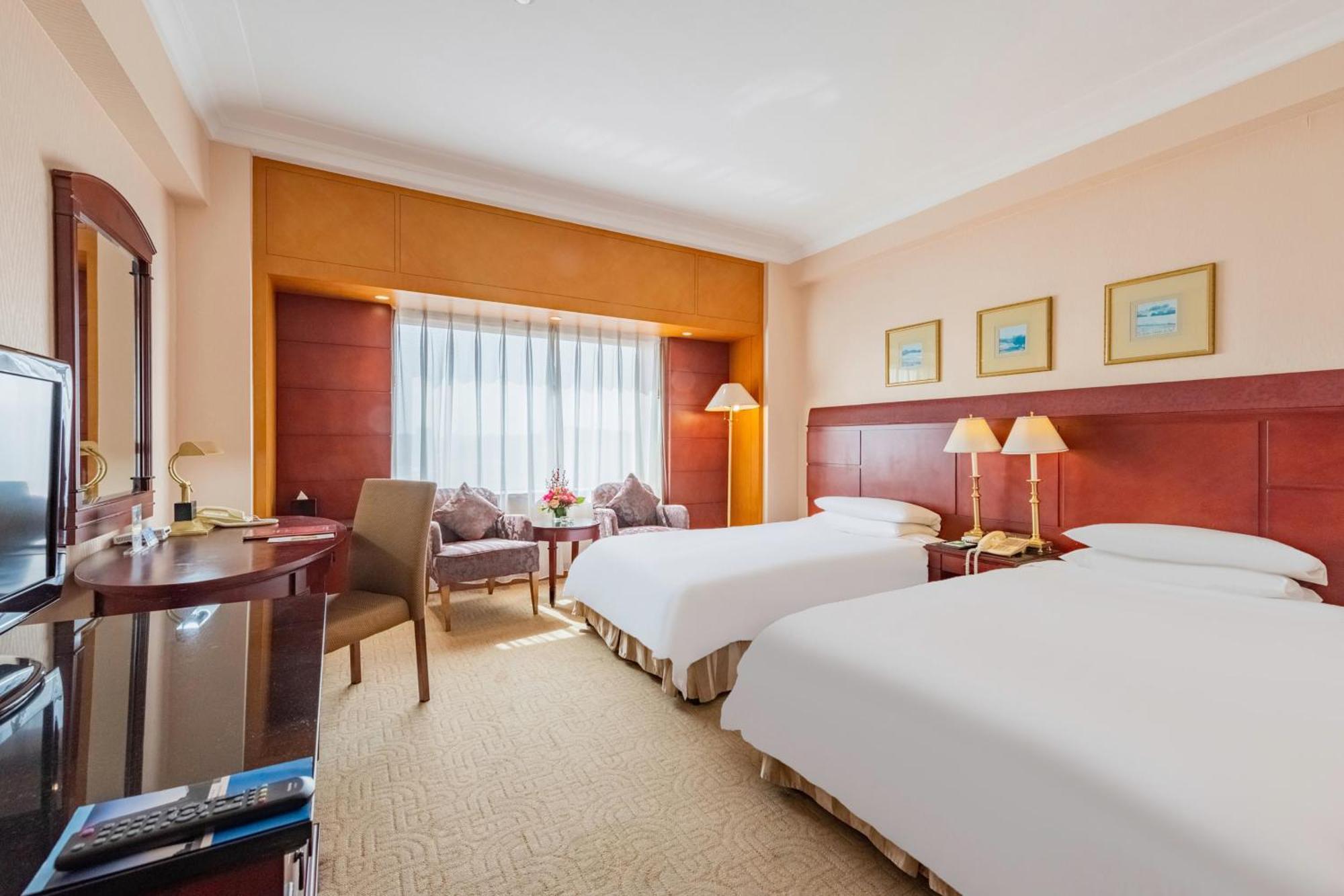 Ruishi Hotel Dalian Bagian luar foto