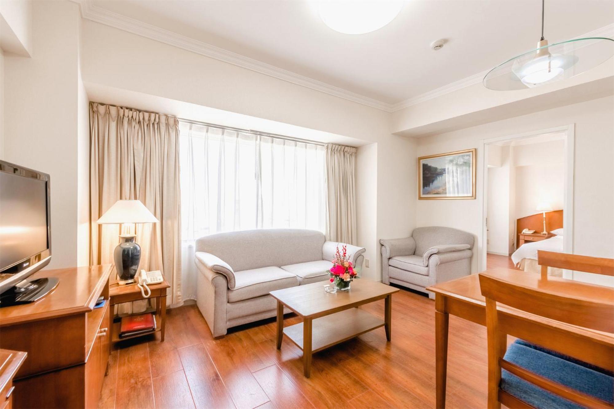 Ruishi Hotel Dalian Bagian luar foto