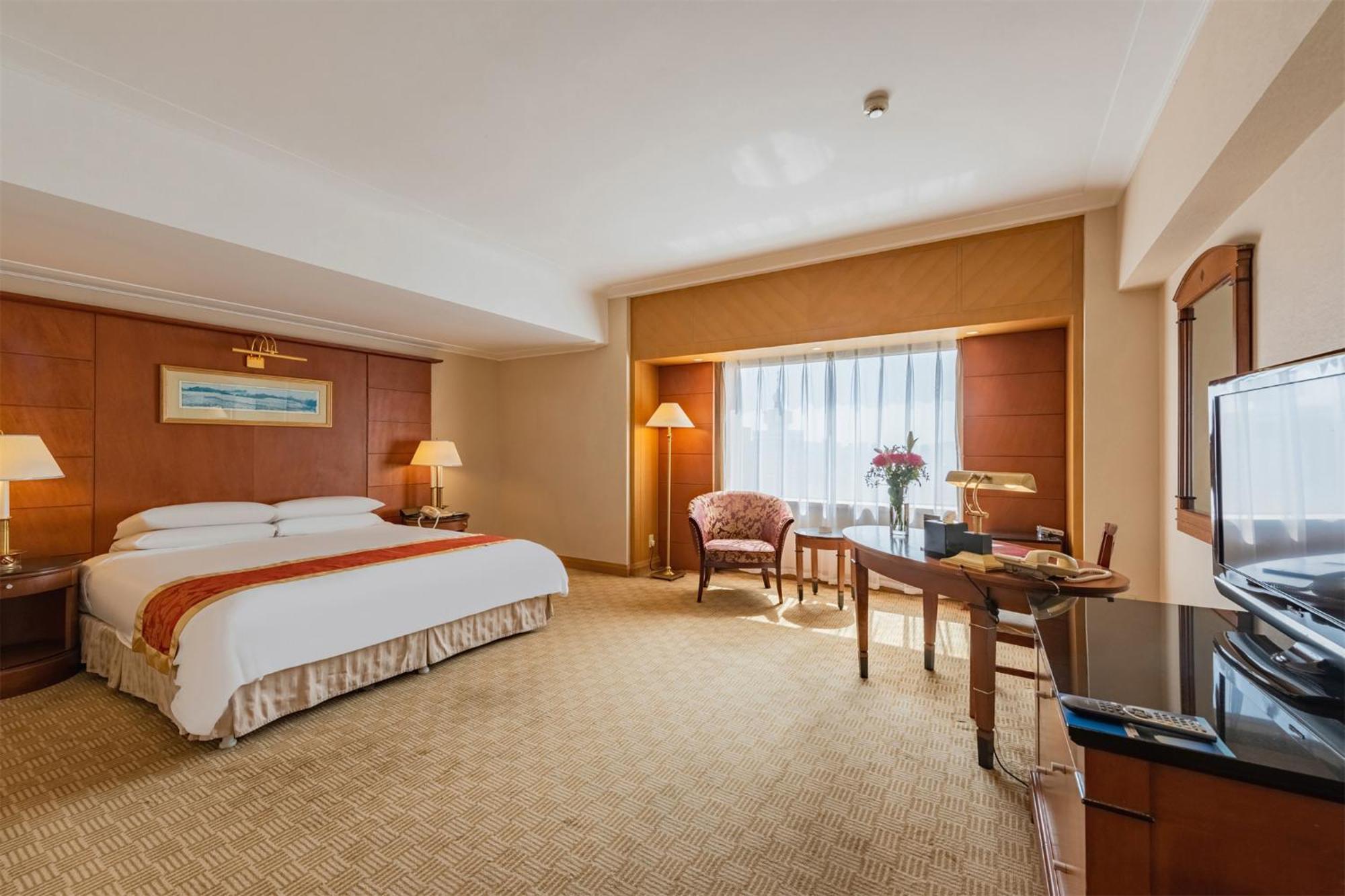 Ruishi Hotel Dalian Bagian luar foto