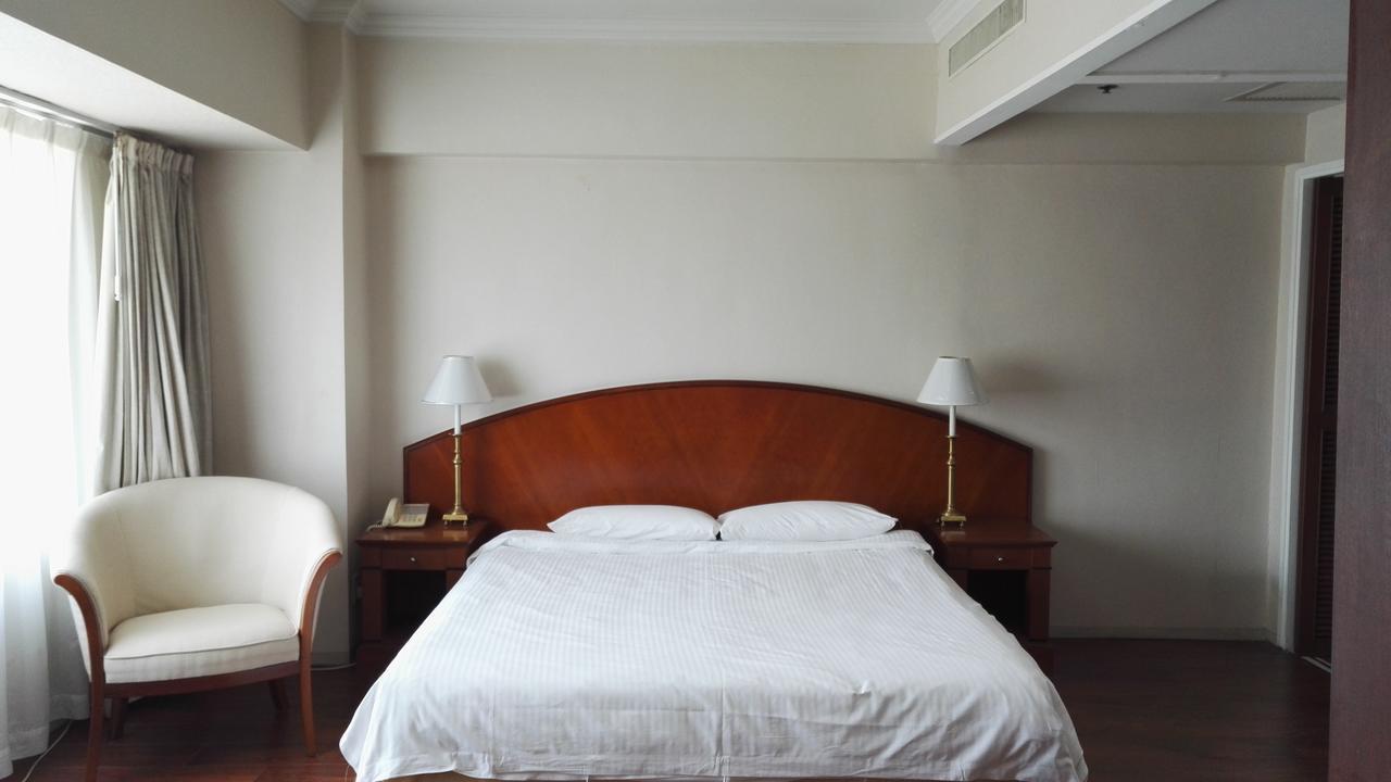 Ruishi Hotel Dalian Bagian luar foto