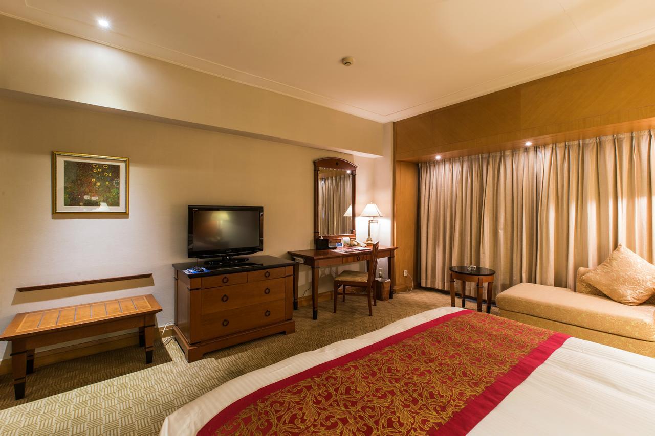 Ruishi Hotel Dalian Bagian luar foto
