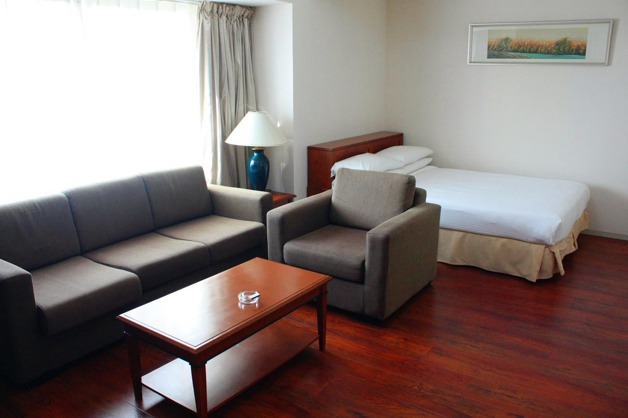 Ruishi Hotel Dalian Bagian luar foto