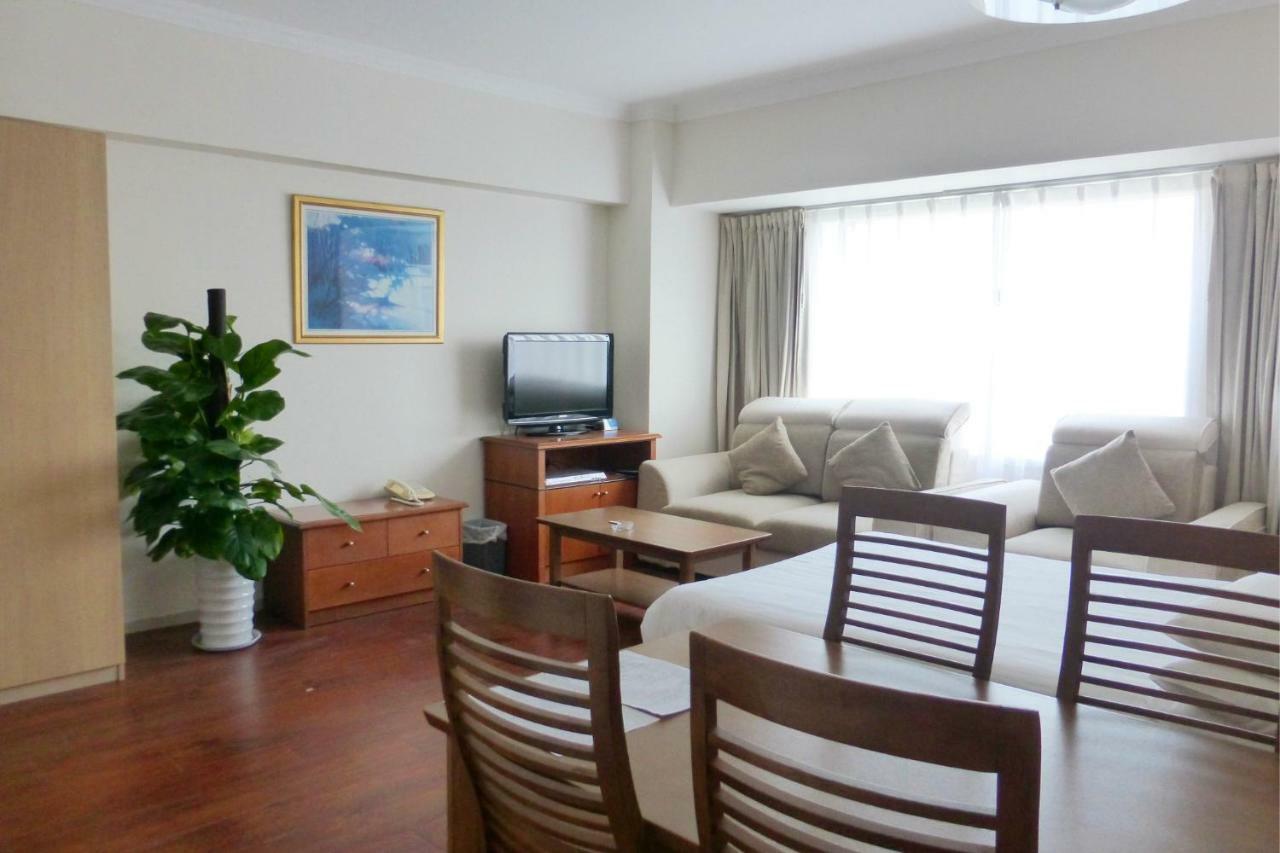 Ruishi Hotel Dalian Bagian luar foto